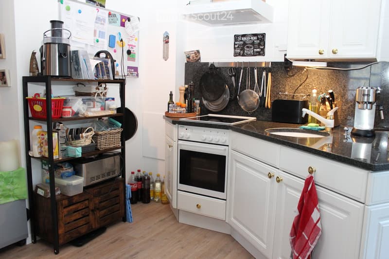 {"type": "Kitchen", "objects": ["refrigerator", "oven", "sink", "faucet", "coffee maker", "toaster", "pot", "pan", "frying pan", "cutting board", "bottle", "oven mitt", "oven", "faucet", "fridge", "oven", "sink", "coffee maker", "oven", "oven", "oven", "o