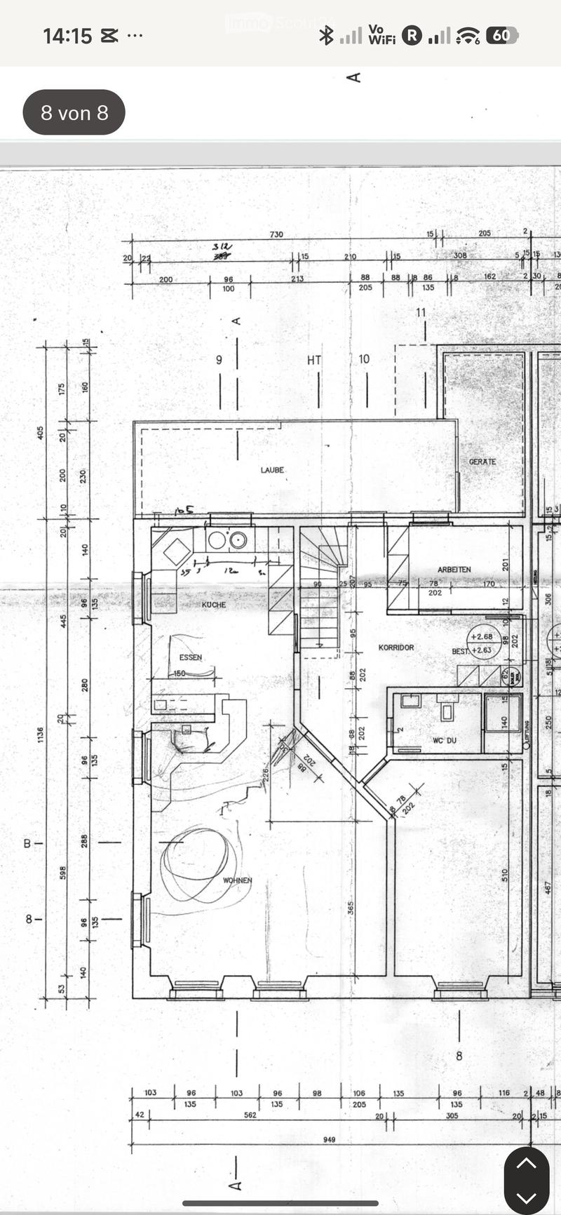 Floor plan showing a kitchen, living area, hallway, and bathroom. Includes labeled dimensions and room names such as KÜCHE (kitchen), WOHNEN (living), KORRIDOR (hallway), and WC DU (bathroom).