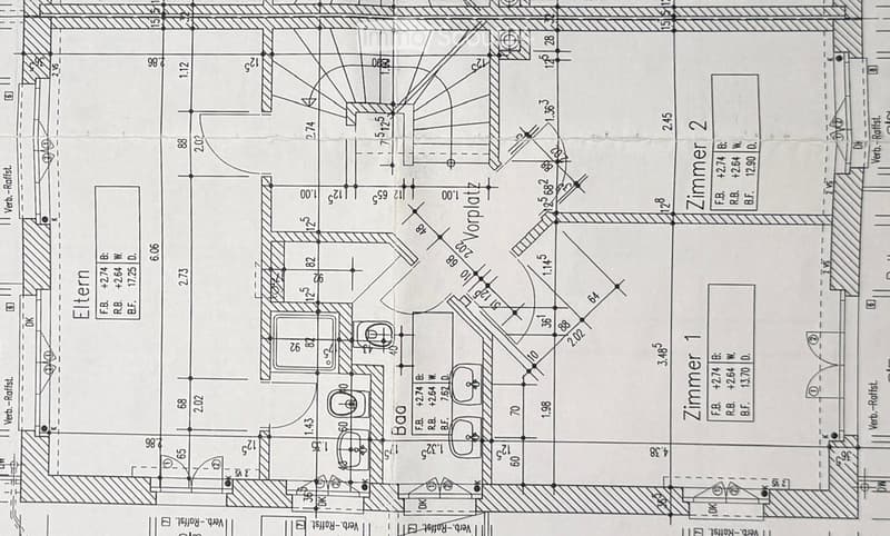 Floor plan showing a layout with labeled rooms and dimensions, including a living area, kitchen, and multiple bedrooms.
