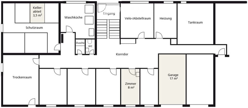 Floor plan of a basement level showing various rooms including a storage room, wash kitchen, entrance, bicycle/storage room, heating room, tank room, corridor, dry room, room, and garage.