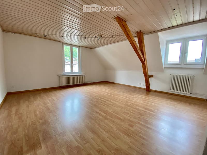 empty room, wooden floor, two windows, wooden beams
