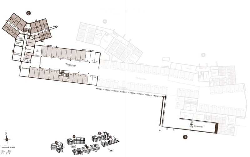 Floor plan of a multi-building complex with labeled rooms, parking areas, and detailed layout including numbered sections and labeled spaces.