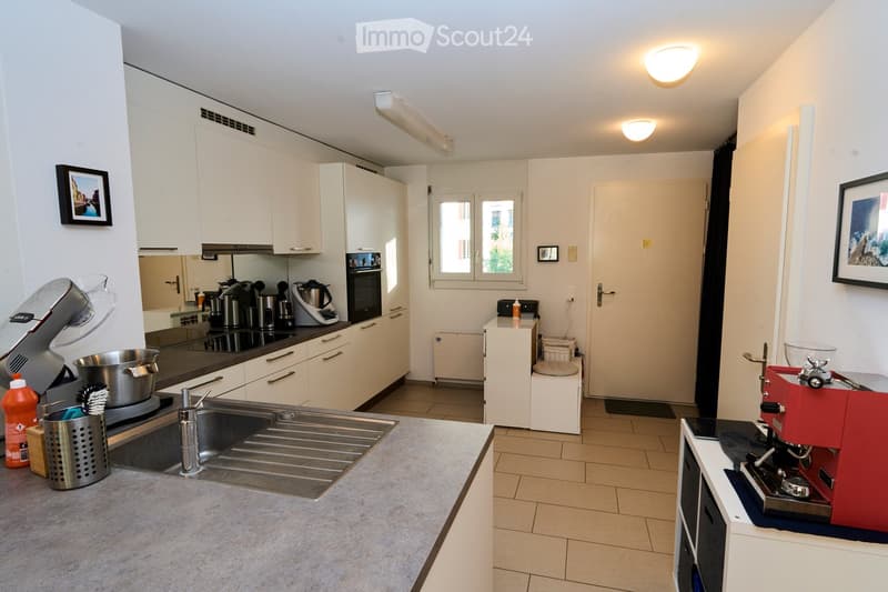 {"type": "Kitchen", "objects": ["sink", "faucet", "coffee maker", "oven", "cabinets", "framed picture", "faucet", "framed picture", "cupboard", "faucet", "oven", "faucet", "faucet", "faucet", "faucet", "faucet", "faucet", "faucet", "faucet", "faucet", "fa