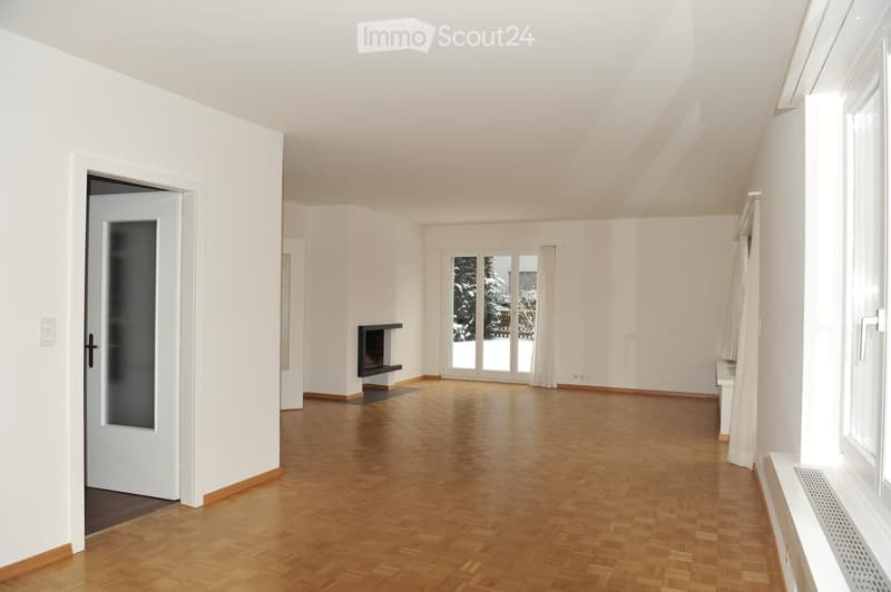 wood floor, fireplace, sliding windows, open door, bright and empty