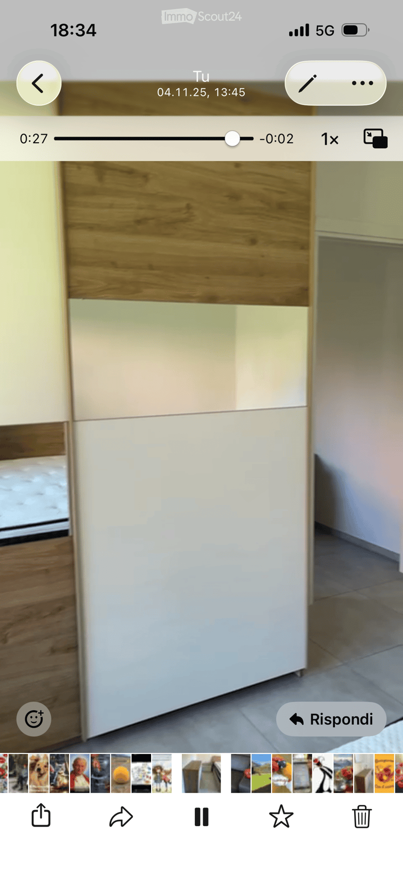 Empty room with light-colored walls and wooden paneling, featuring a tiled floor and no visible furniture or equipment.