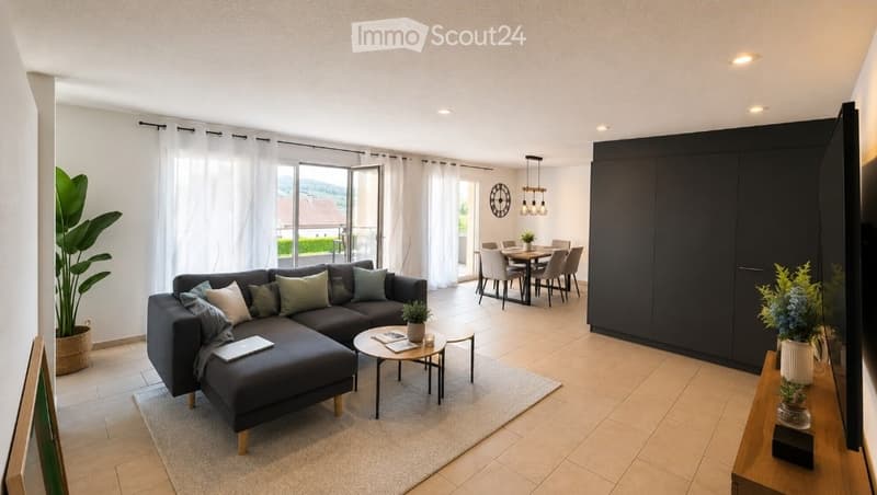 Modern living and dining area with a grey sectional sofa, coffee table, dining table with chairs, large windows, and a tall plant in the corner.