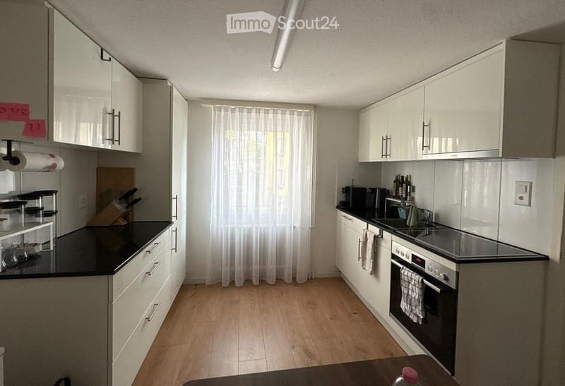 {"type": "Kitchen", "objects": ["cabinets", "oven", "stove", "sink", "faucet", "cutting board", "knives", "oven mitt", "oven mitt", "oven mitt", "oven mitt", "oven mitt", "oven mitt", "oven mitt", "oven mitt", "oven mitt", "oven mitt", "oven mitt", "oven