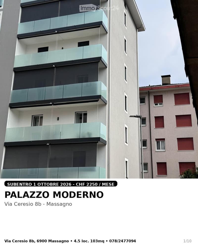 Modern multi-story building with glass balconies and contemporary design, located in an urban setting.