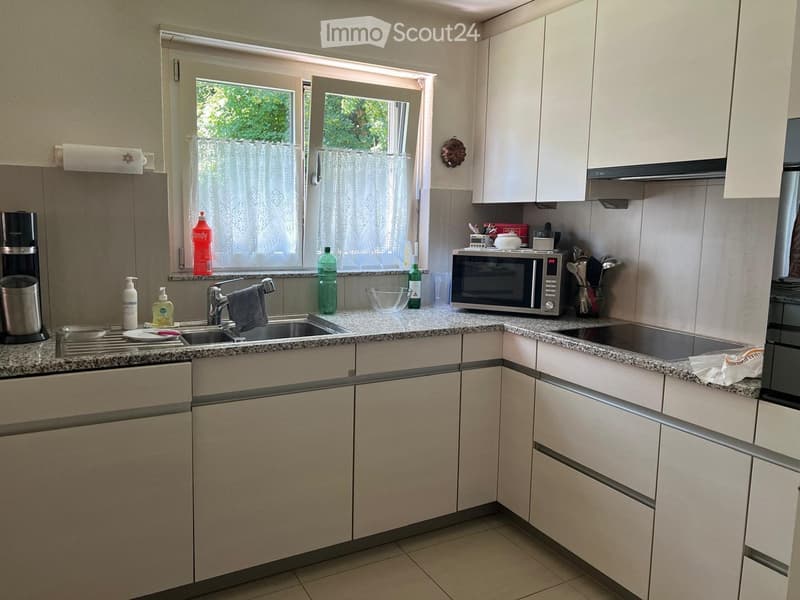 {"type": "Kitchen", "objects": ["sink", "faucet", "microwave", "coffee maker", "cupboard", "bottle", "cup", "faucet", "faucet", "cupboard", "cupboard", "cupboard", "cupboard", "cupboard", "cupboard", "cupboard", "cupboard", "cupboard", "cupboard", "cupboa