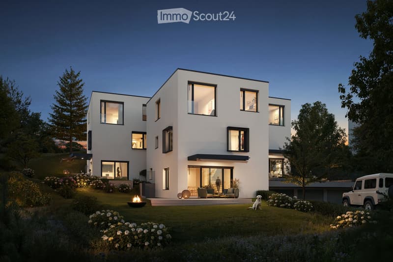 Modern two-story house with white exterior, large windows, balcony, garden, and fire pit.