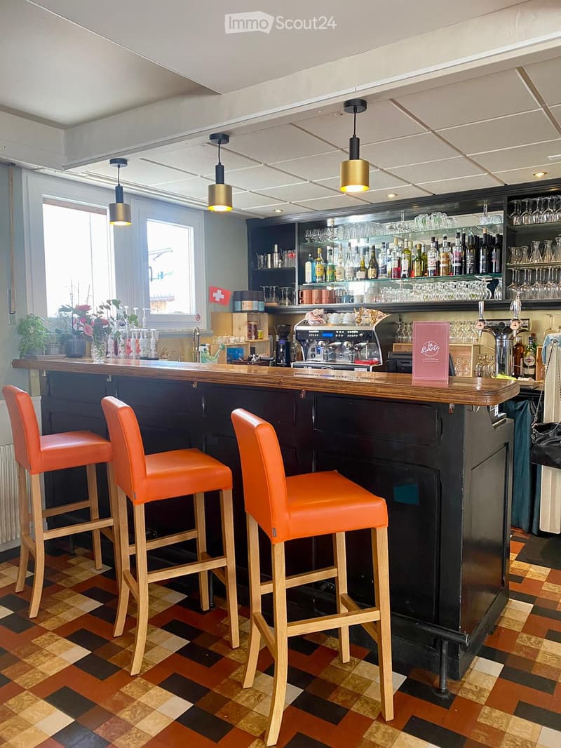 {"type": "Furnished Room", "objects": ["bar counter", "stool", "coffee machine", "cupboard", "bottle", "cup", "faucet", "faucet", "faucet", "faucet", "faucet", "faucet", "faucet", "faucet", "faucet", "faucet", "faucet", "faucet", "faucet", "faucet", "fauc