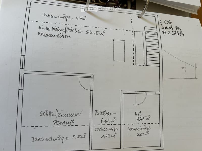 Hand-drawn floor plan showing a two-story building with labeled areas including a living room, bedroom, and attic spaces.