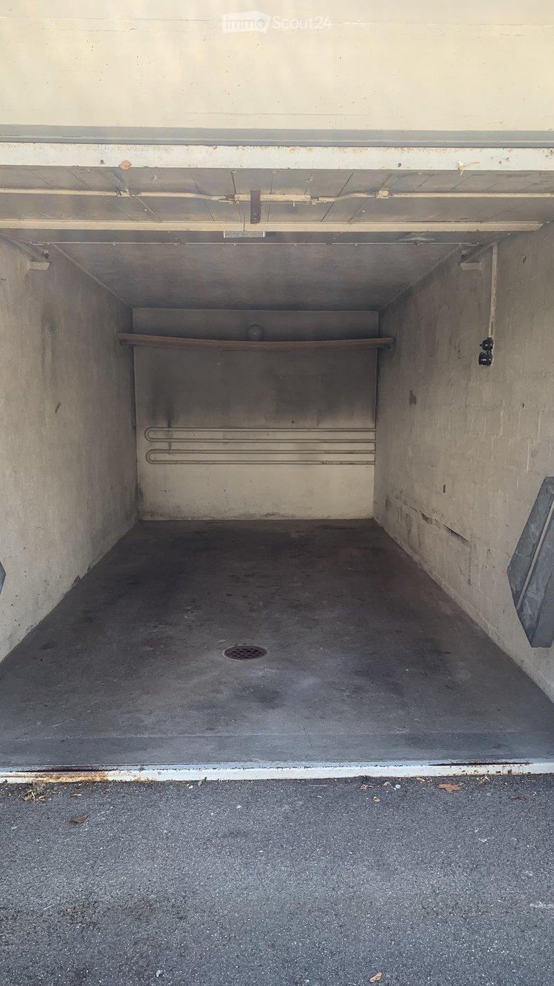 {"visible_features": ["Garage"], "type": "Garage", "objects": [], "description": "Empty underground garage with concrete walls, a single wooden shelf, and a metal ramp leading up.", "localized_descriptions": {"EN": "Empty underground garage with concrete