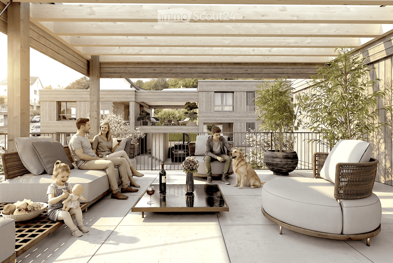 A modern, spacious outdoor terrace with a wooden pergola, seating areas including sofas and chairs, a coffee table with wine glasses and a bottle, a vase with flowers, and a dog sitting nearby. The terrace is surrounded by greenery and overlooks a residen