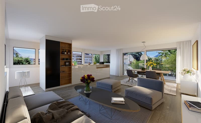 Modern living room with large windows, a grey sofa, coffee table, ottoman, dining area, and a balcony view.
