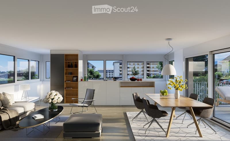 Modern living and dining area with large windows, white walls, and light wood flooring. Features a sofa, coffee table, ottoman, dining table with chairs, and decorative vases with flowers.