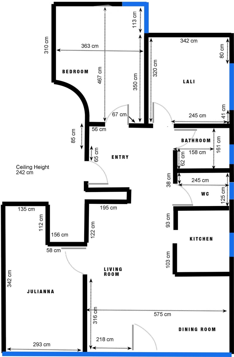 Floor plan showing a bedroom, living room, dining room, kitchen, bathroom, WC, and entryway with labeled dimensions.