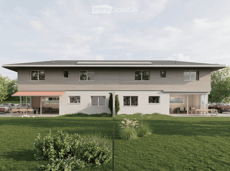 House. Modern two-story house with large windows, flat roof, and covered outdoor seating areas. The house is surrounded by a well-maintained lawn and garden.