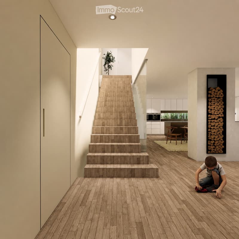Modern hallway with wooden flooring, a staircase leading upwards, and a view into a kitchen area with white cabinets and a dining table with chairs. A child is seen sitting on the floor near a wall with a wood storage display.