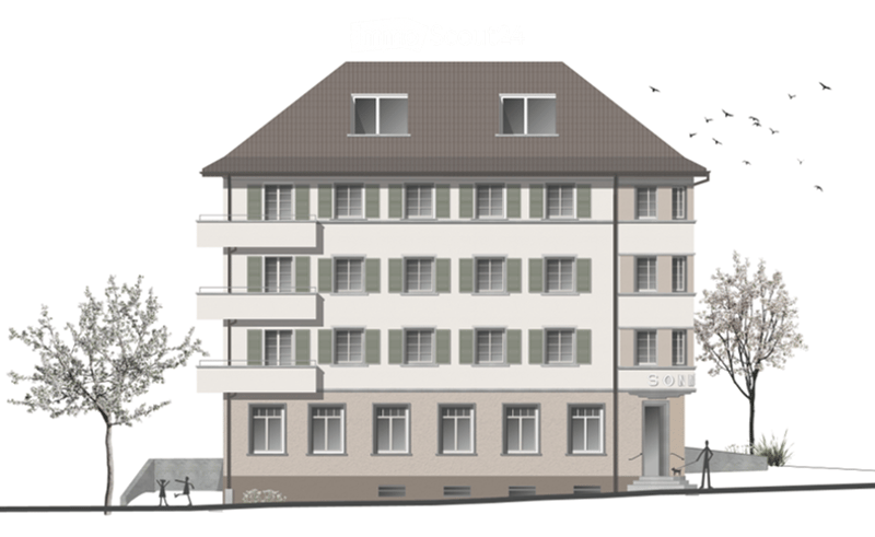 A multi-story residential building with a classic facade, green shutters, and multiple windows. The building has a flat roof and a small entrance area with steps leading up to the door.