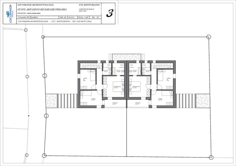 First-floor plan of a two-family house with two apartments, each featuring a bedroom, bathroom, and terrace.