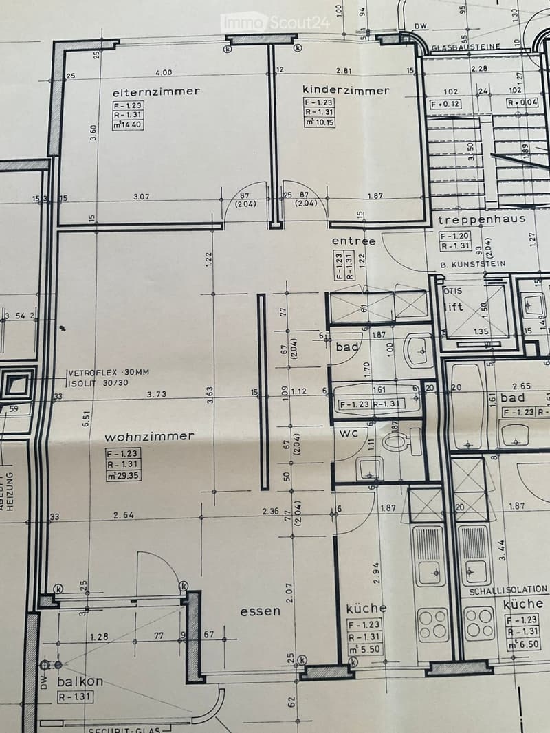 Floor plan showing a multi-room layout including a living room, dining area, kitchen, two bedrooms, two bathrooms, a hallway, and a balcony.
