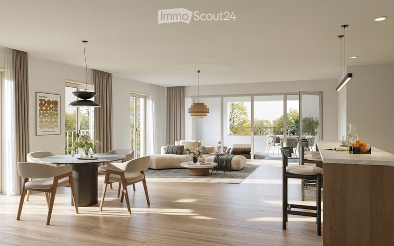 Open-plan living and dining area with modern furniture, pendant lights, and a kitchen island. Features a sofa, coffee table, ottoman, dining table with chairs, and a kitchen island with stools.