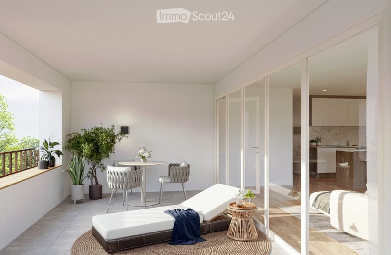 Modern balcony with white walls, large windows, sunbed, small table, chairs, and potted plants.