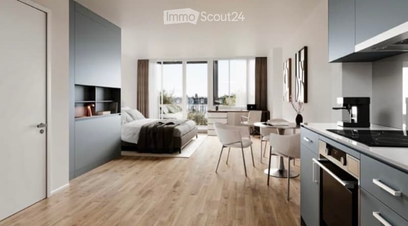 open layout with bedroom, dining area, kitchen, and large windows, balcony