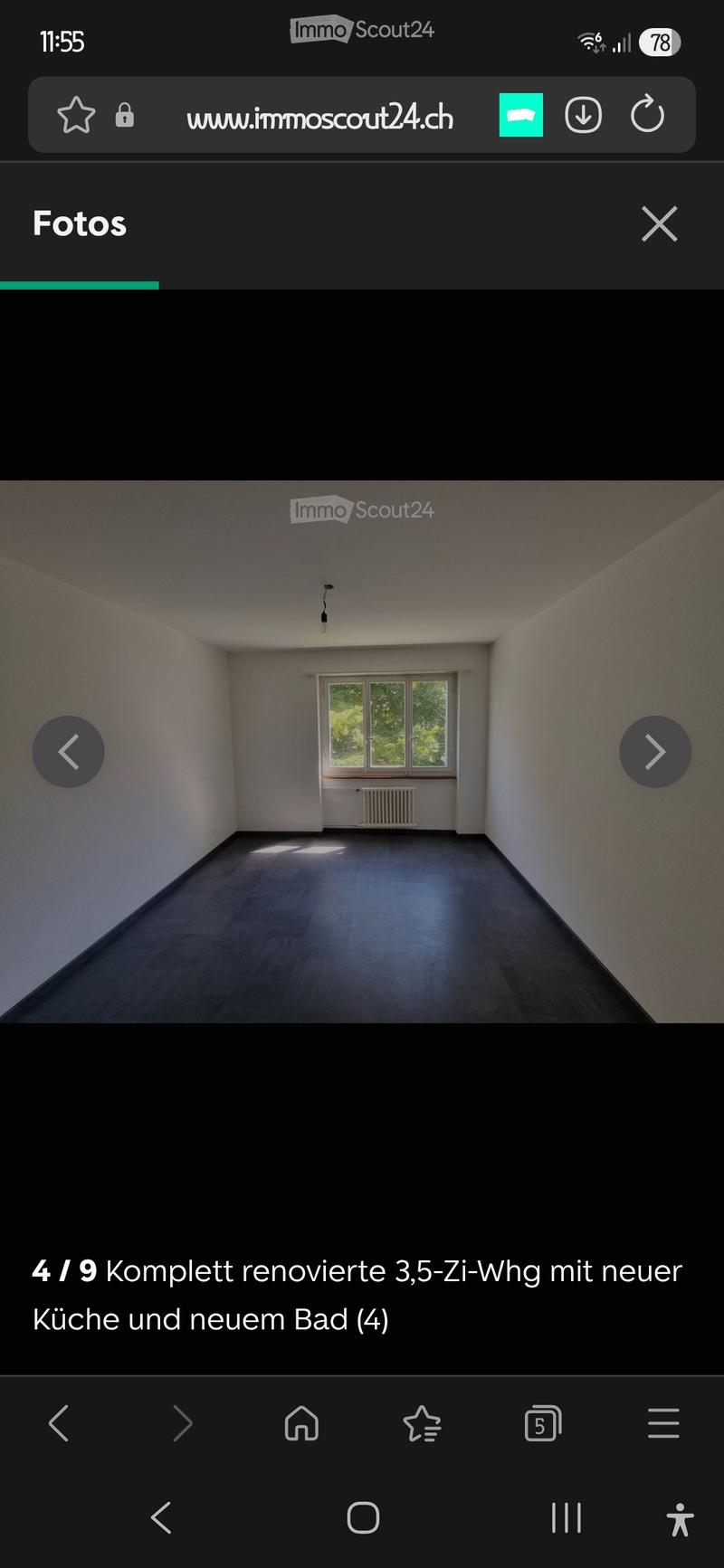 Empty room with bare walls, wooden floor, and a single window with a radiator below it.