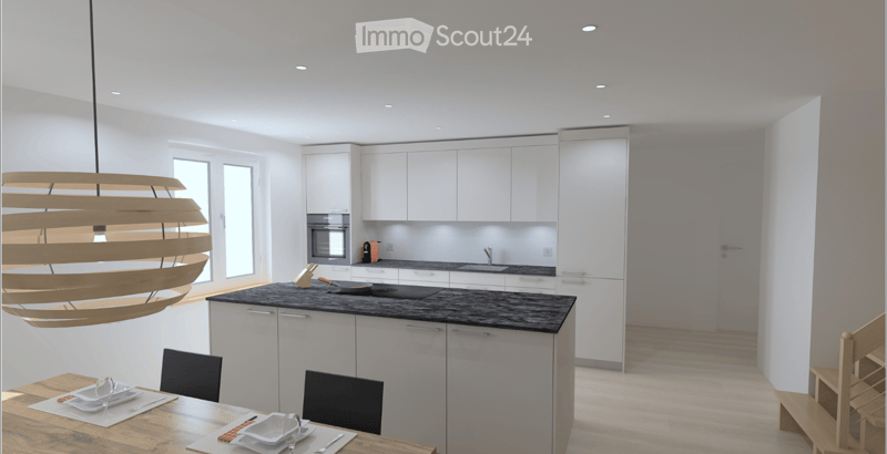 Modern kitchen with white cabinets, black countertop, built-in oven, sink, and a wooden dining table with chairs. A large pendant light hangs from the ceiling.