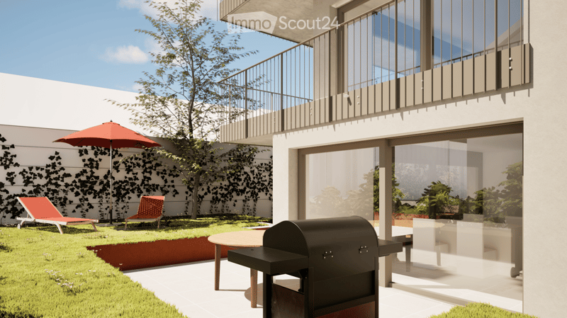 Modern outdoor patio with a grill, umbrella, chairs, and a small table, surrounded by greenery and a modern building with large windows and a balcony.