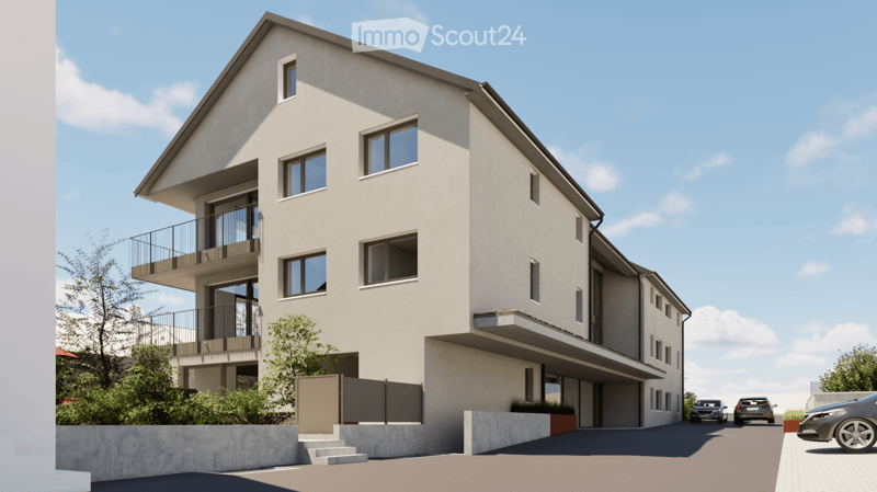 Modern two-story residential building with balconies, large windows, and a raised ground floor entrance.