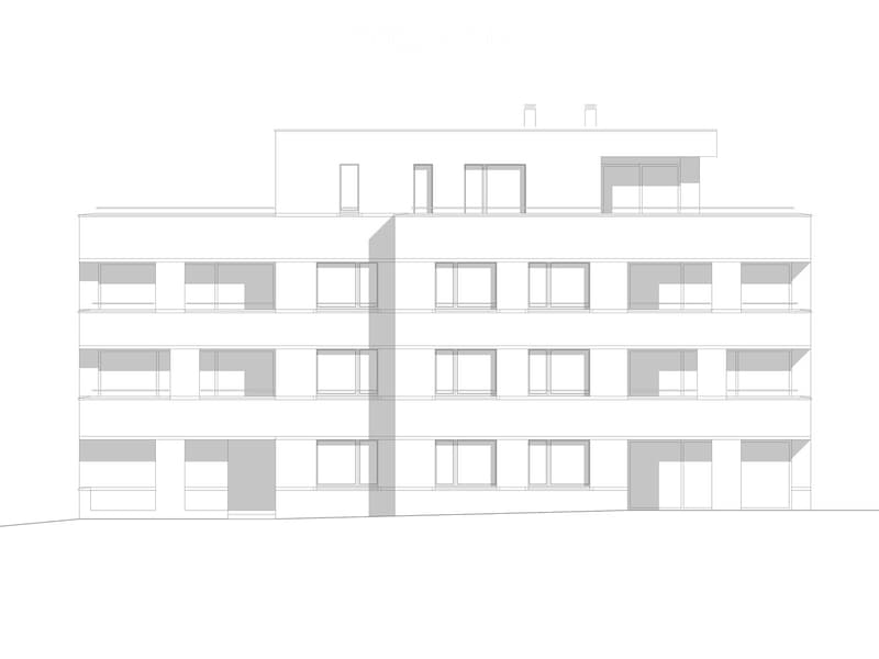 Floor plan of a multi-story building with multiple rooms and windows, including a rooftop terrace.