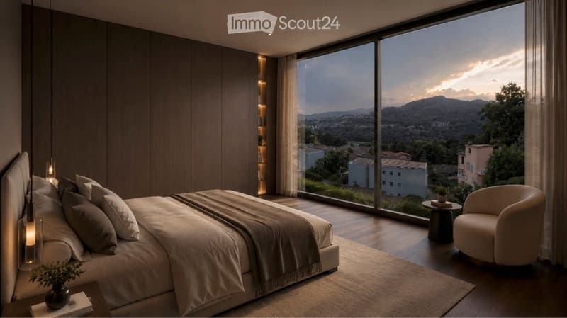 Modern bedroom with a large bed, nightstand, armchair, side table, and scenic mountain view through large windows.