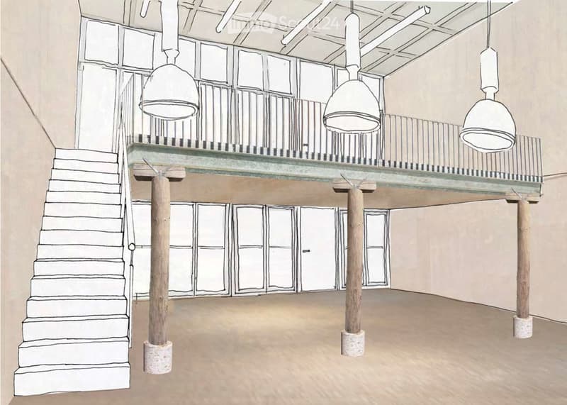 Floor plan of a spacious interior with a staircase leading to an upper level, supported by wooden columns, and large windows on the upper level.
