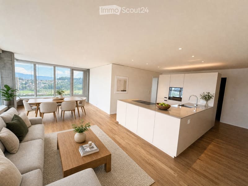 Modern open-plan living and dining area with a kitchen island, sofa, coffee table, dining table, and chairs. Large windows offer a scenic view.