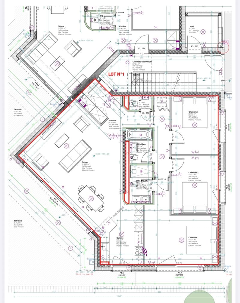 Floor plan of a residential unit labeled 'LOT N° 1' showing multiple rooms including living room, kitchen, bedrooms, bathrooms, and a terrace.