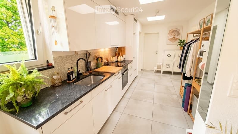 {"type": "Kitchen", "objects": ["sink", "faucet", "oven", "cabinets", "cutting board", "faucet", "faucet", "faucet", "faucet", "faucet", "faucet", "faucet", "faucet", "faucet", "faucet", "faucet", "faucet", "faucet", "faucet", "faucet", "faucet", "faucet"