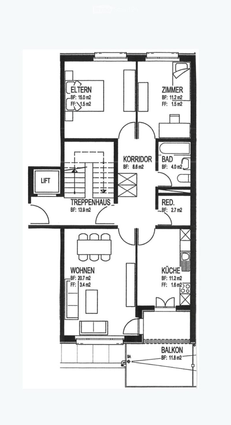 Floor plan showing a multi-level layout with rooms labeled in German: Wohnzimmer (living room), Küche (kitchen), Schlafzimmer (bedroom), Bad (bathroom), Balkon (balcony), Korridor (hallway), Treppe (stairs), and additional spaces including a lift and a st