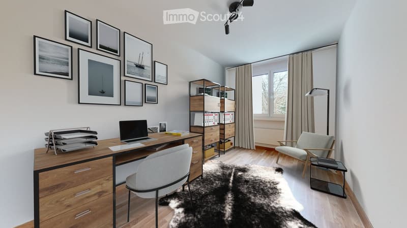 Modern, well-lit study or home office with a wooden desk, laptop, ergonomic chair, shelving unit, floor lamp, and decorative picture frames on the wall.