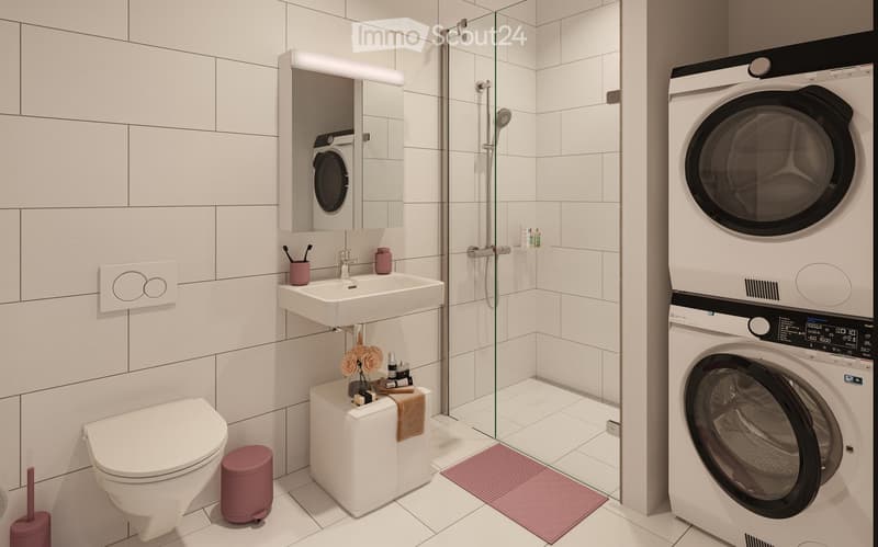 Modern bathroom with white tiles, a toilet, a sink with a mirror, a shower with a glass enclosure, a washing machine, and decorative items including a flower vase and a towel.