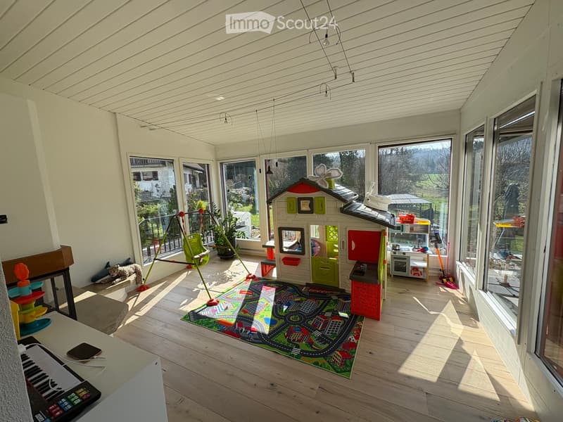 {"type": "Furnished Room", "objects": ["toy house", "toy kitchen", "toy stove", "toy refrigerator", "toy sink", "toy oven", "toy microwave", "toy table", "toy chair", "toy swing", "toy piano", "toy car track", "toy car", "toy animal", "toy chair", "toy ta