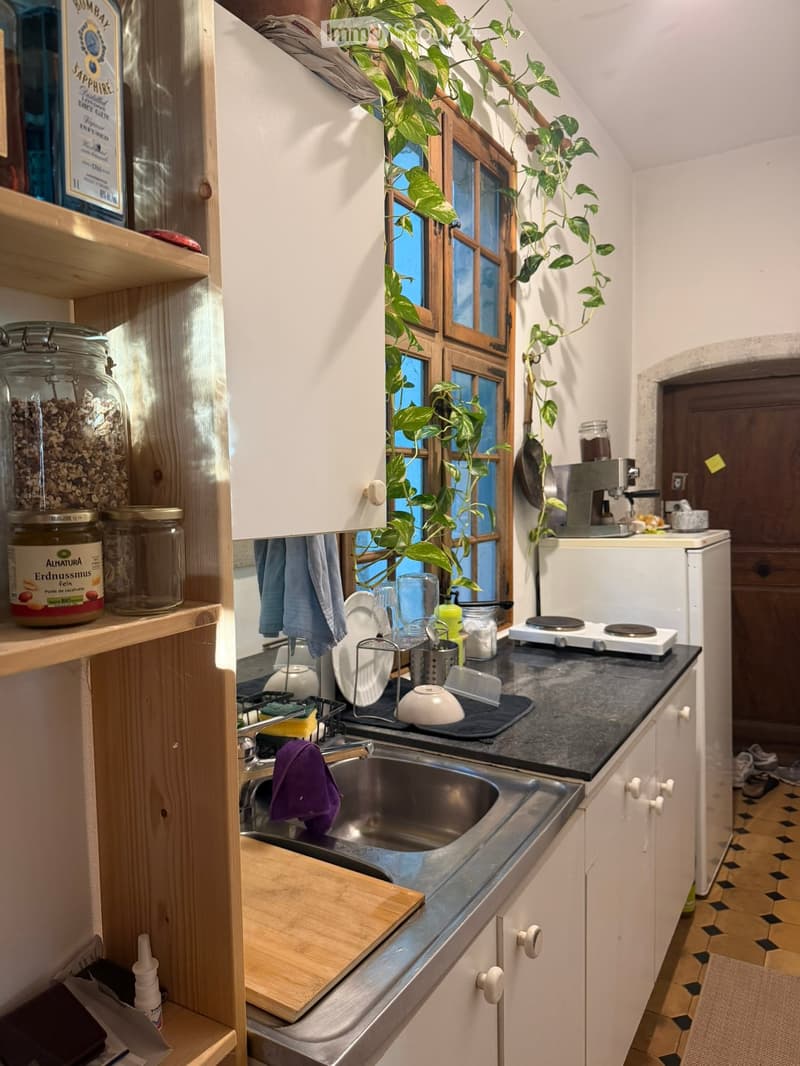 {"type": "Kitchen", "objects": ["sink", "faucet", "cutting board", "fridge", "oven", "cupboard", "fridge", "oven", "faucet", "cupboard", "faucet", "oven", "cupboard", "oven", "cupboard", "oven", "cupboard", "oven", "cupboard", "oven", "cupboard", "oven",