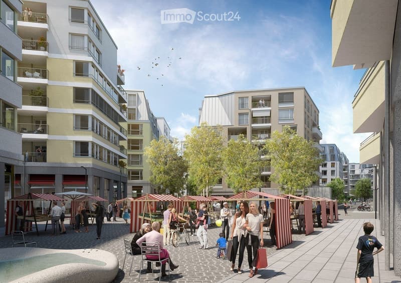A modern urban development with multi-story residential buildings, balconies, and a bustling outdoor market area with market stalls, people, and trees.