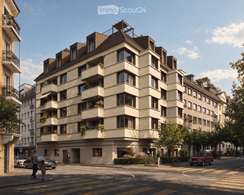 Modern multi-story residential building with balconies and large windows, located on a street with pedestrians and parked cars.