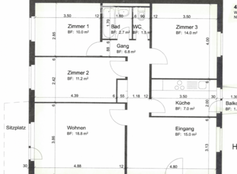 Floor plan showing a layout with four bedrooms, a bathroom, a kitchen, a living area, a hallway, and a balcony.