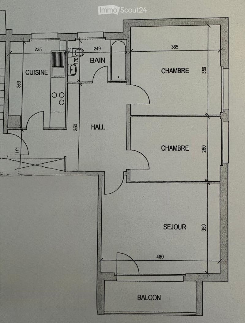 Floor plan showing a kitchen, two bedrooms, a living room, a hallway, a bathroom, and a balcony.