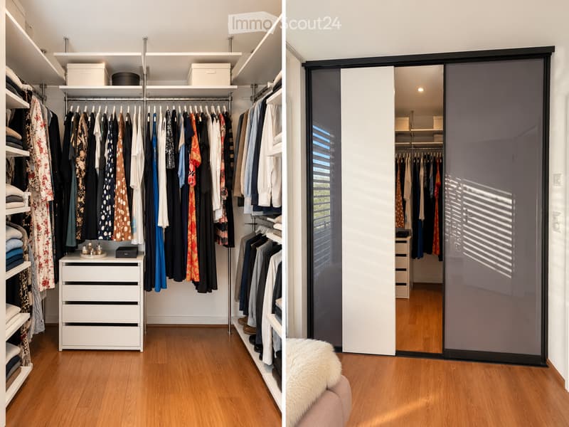 A well-organized walk-in closet with wooden flooring, white walls, and multiple clothing racks, shelves, and drawers. A large mirrored sliding door provides access to the closet.