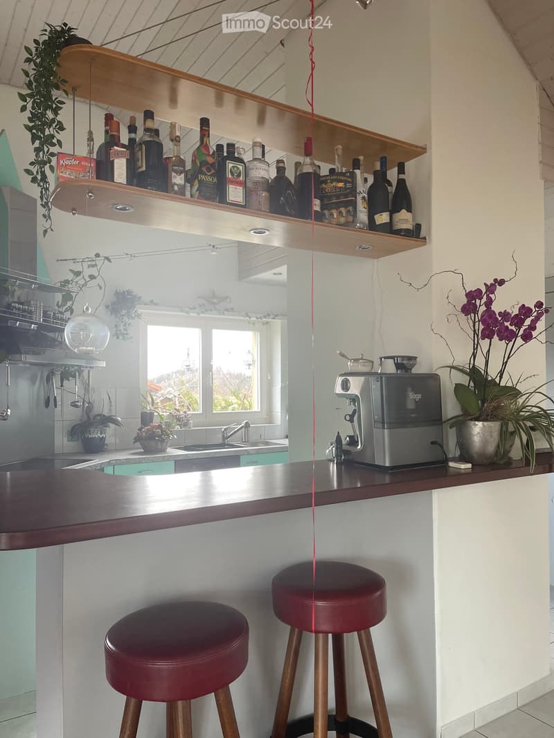 {"type": "Kitchen", "objects": ["stool", "stool", "coffee machine", "sink", "faucet", "bottle", "bottle", "bottle", "bottle", "bottle", "bottle", "bottle", "bottle", "bottle", "bottle", "bottle", "bottle", "bottle", "bottle", "bottle", "bottle", "bottle",